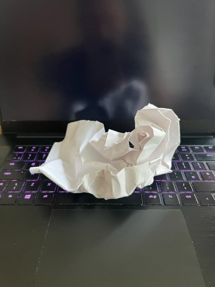 Crumpled Paper on a Computer