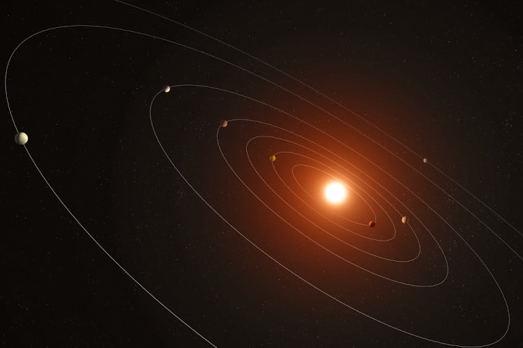 artist rendering of seven-planet system spotted by NASA