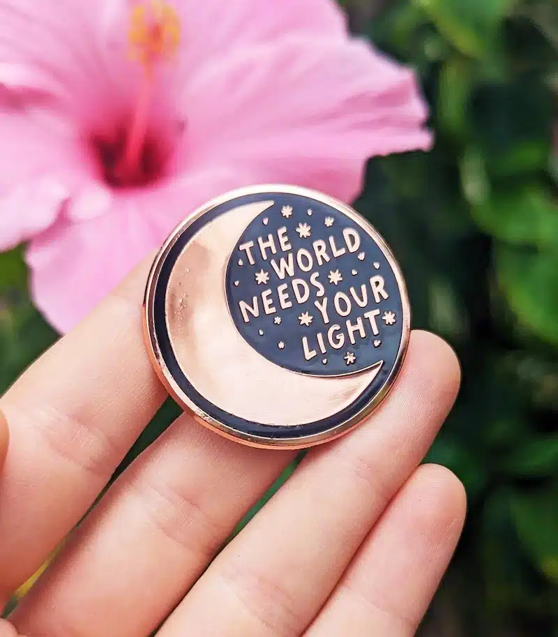 the world needs your light inspirational enamel pin