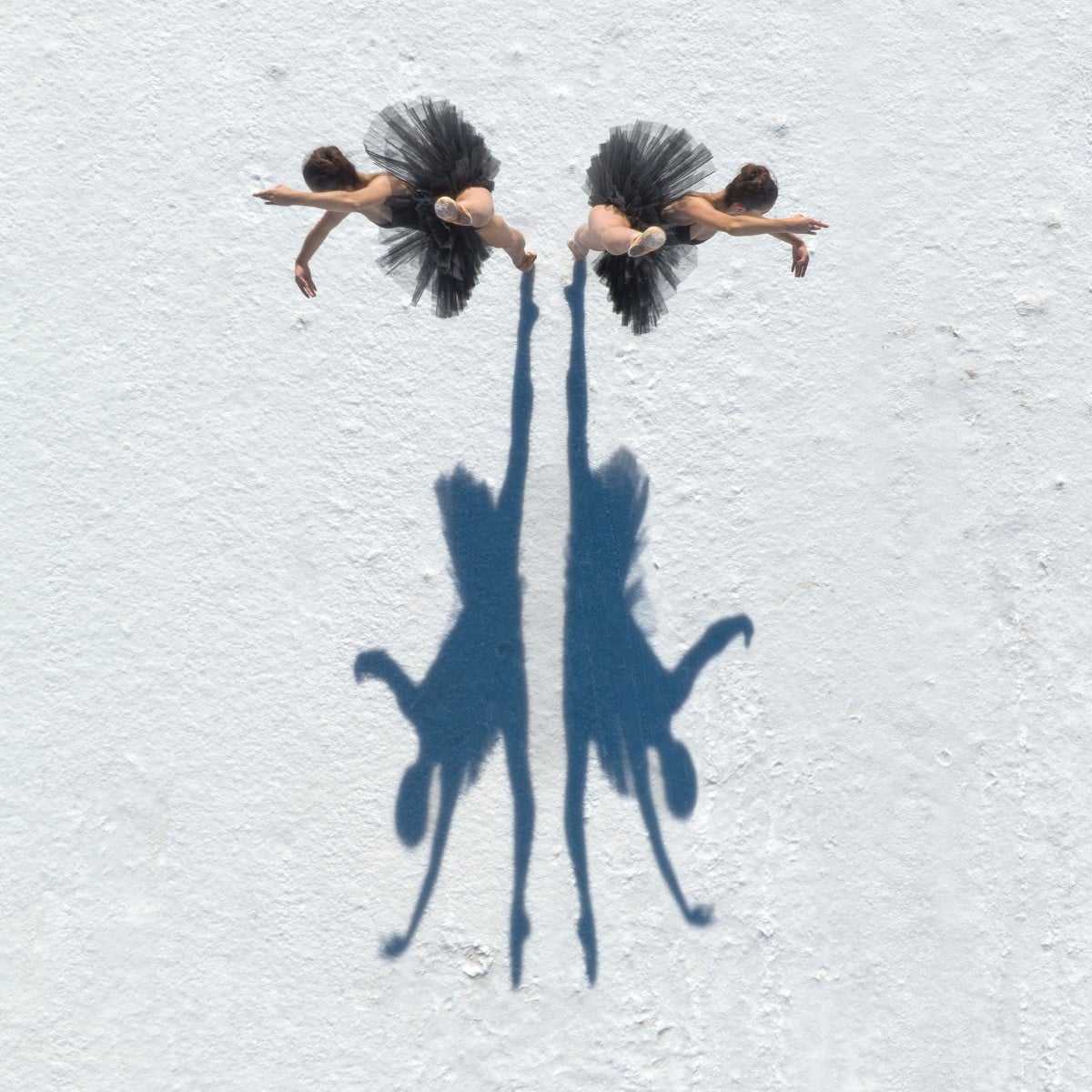 Two ballerinas on Utah's salt flats