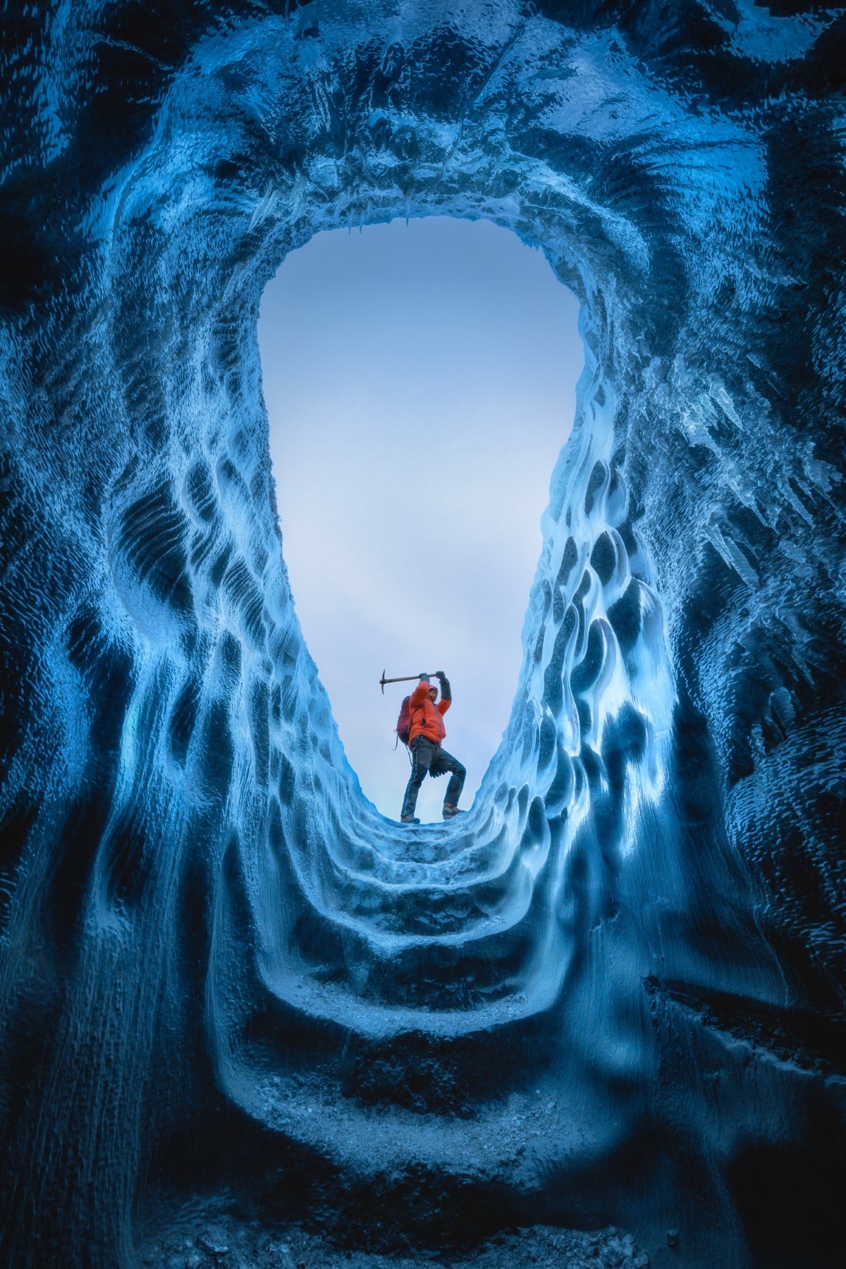 Hiker in an ice cave
