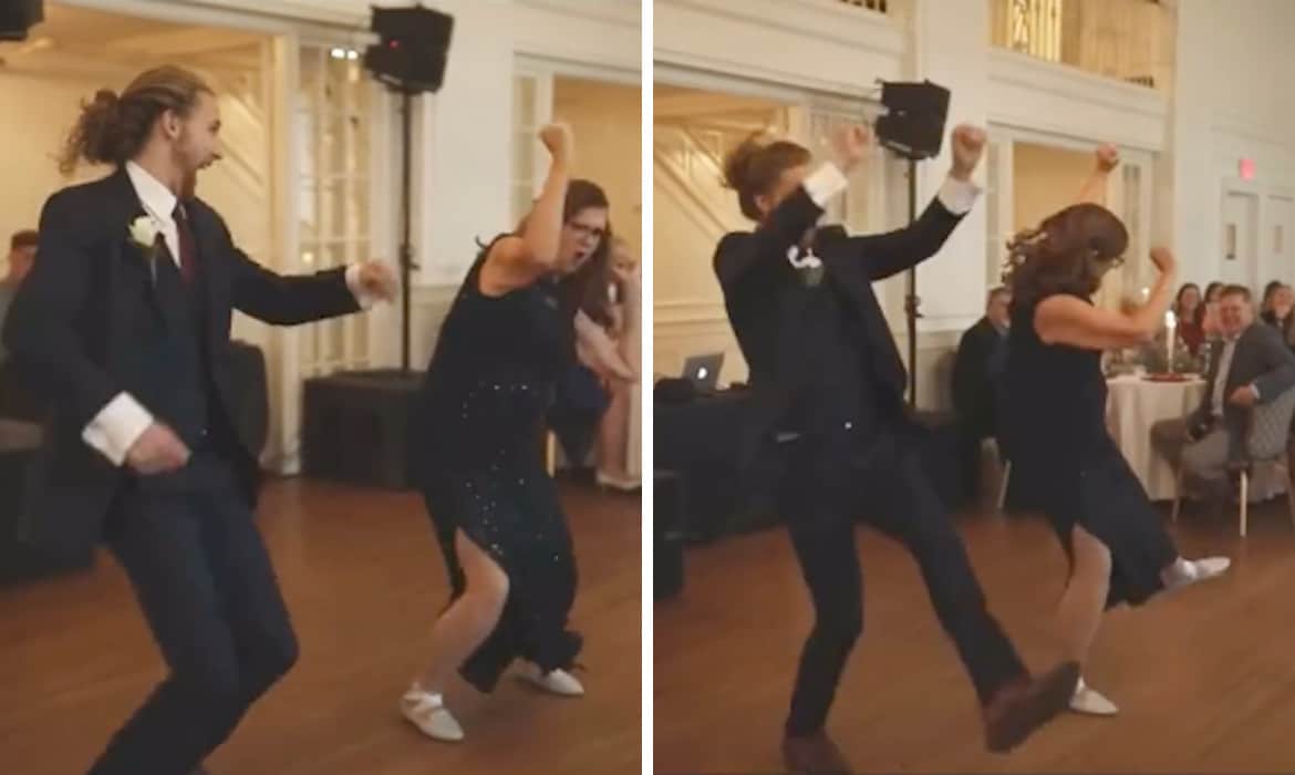 groom and mother dancing wildly at wedding