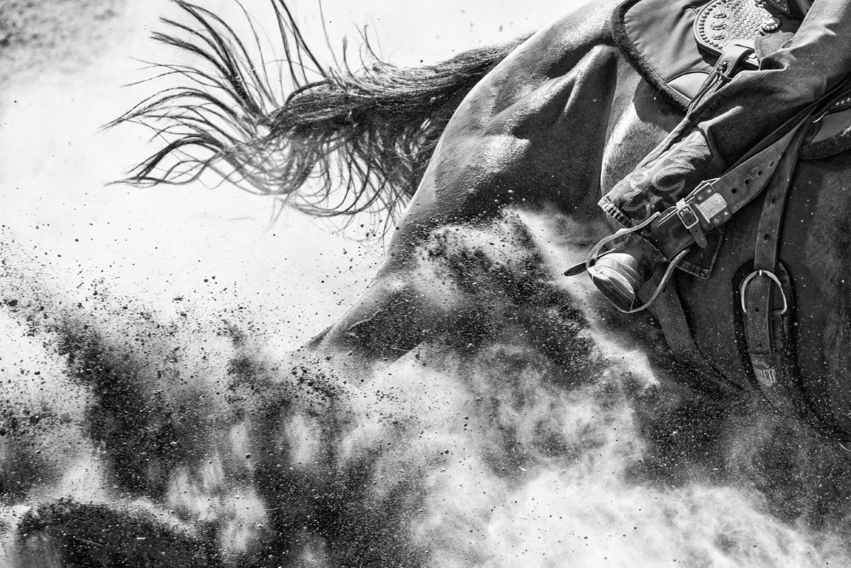 Black and white photo of barrel racing