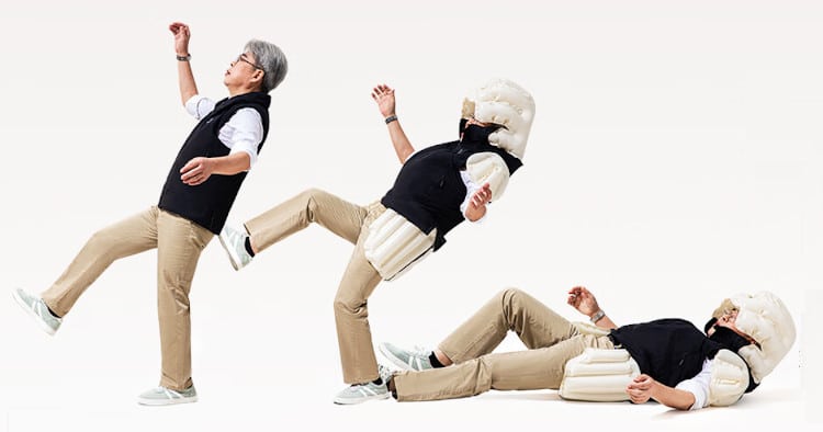 man falling backwards with wearable airbags