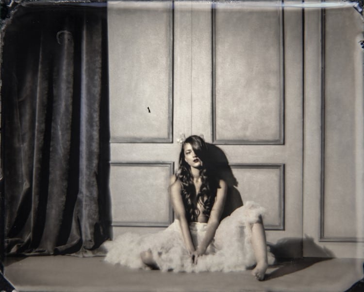 Artistic Wet Collodion Photo of a Woman Sitting on the Floor