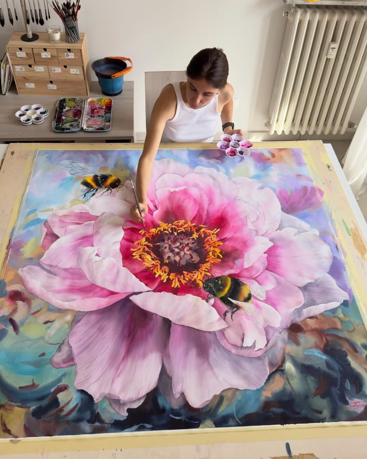 Janet Pulcho Painting Flower and Bees at Table