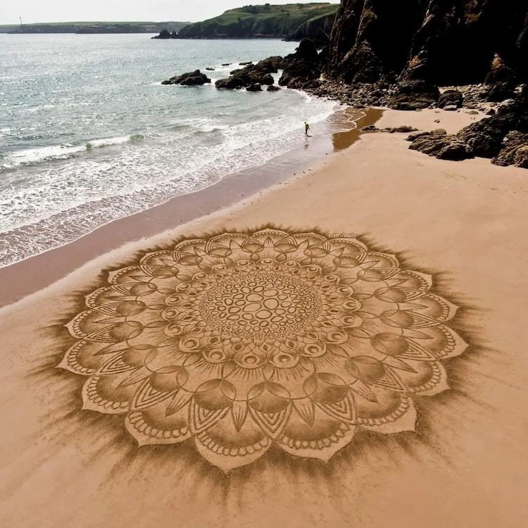 Giant mandala beach drawing by Jon Foreman