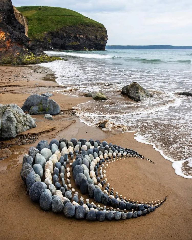 Arrangement Of Stones Into Half Moon Shape On Beach
