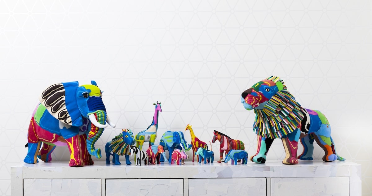 Different animal sculptures all made of colorful flip-flops