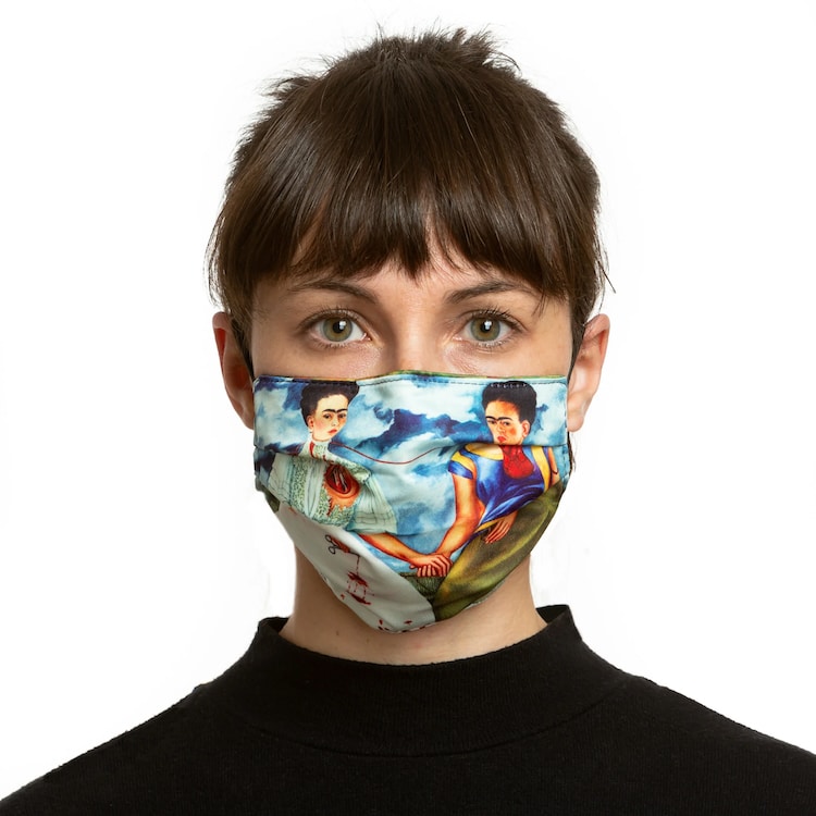 Woman wearing a Frida Kahlo face mask