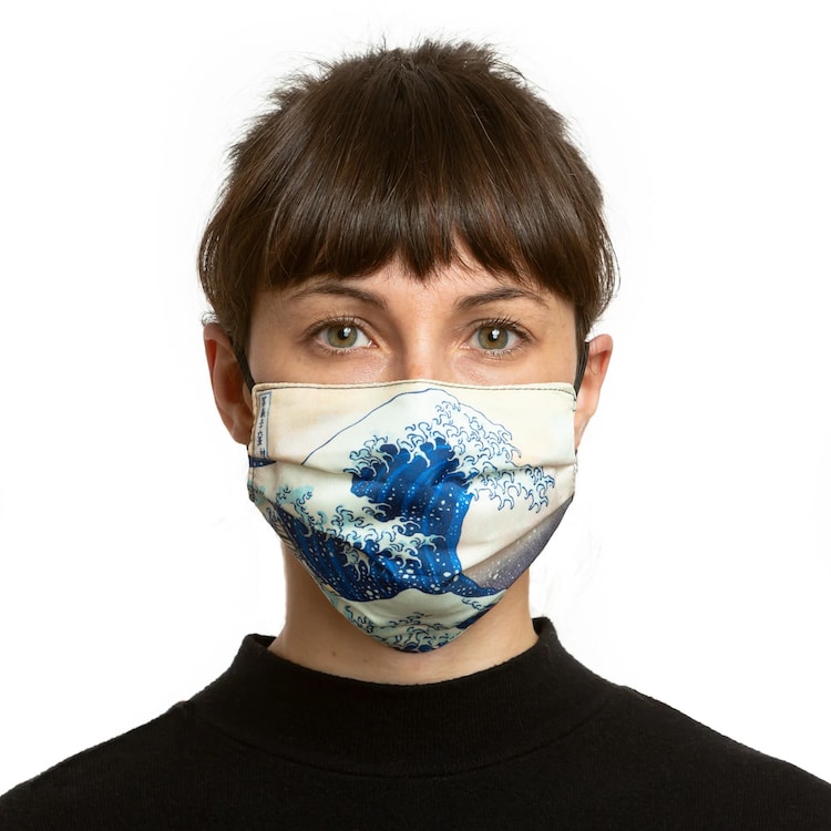 Woman wearing a Hokusai Great Wave face mask
