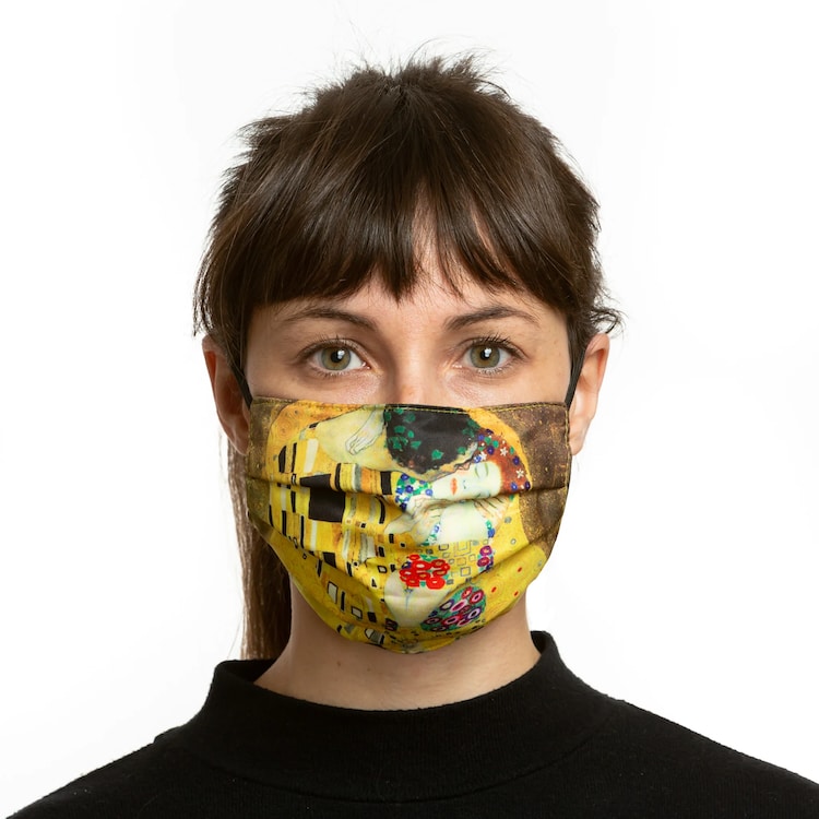 Woman wearing a Klimt The Kiss face mask