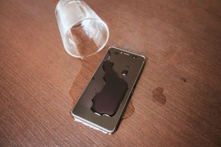 Glass Of Water Spilled On Phone