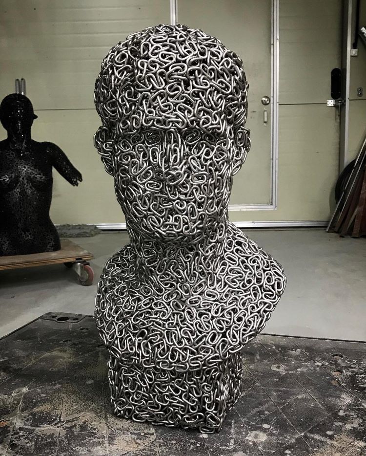 Bust Statue Of A Man Made Of Chains