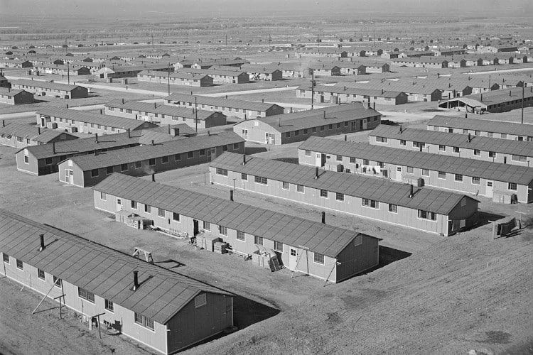 Granada Relocation Center, Amache, Colorado. A general all over view of a section of the emergency center looking north and west in 1942