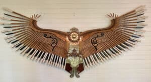 Artist David Cox Turns Pianos Into Sweeping Phoenix Sculptures