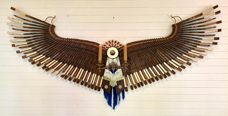 Phoenix sculpture made out of a vintage piano
