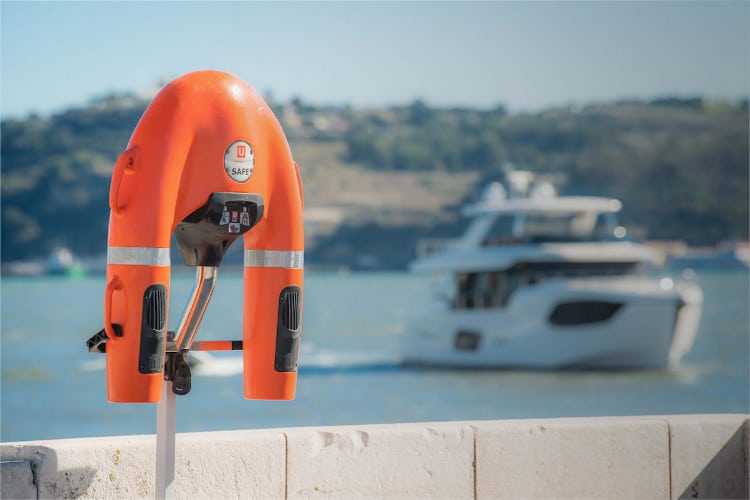 U Safe Remote Controlled lifesaver with boat on the background