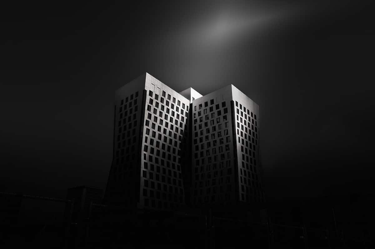 Black and white photo of an office building in Amsterdam