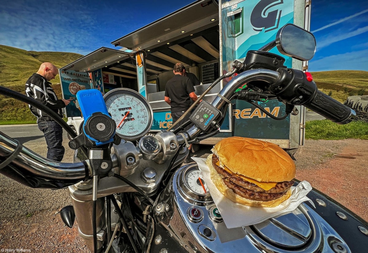 Burger resting on a motorcycle