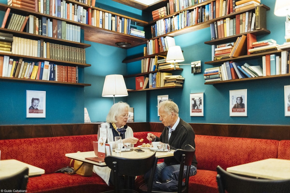 Couple at a caffe in Vienna sharing a strudel