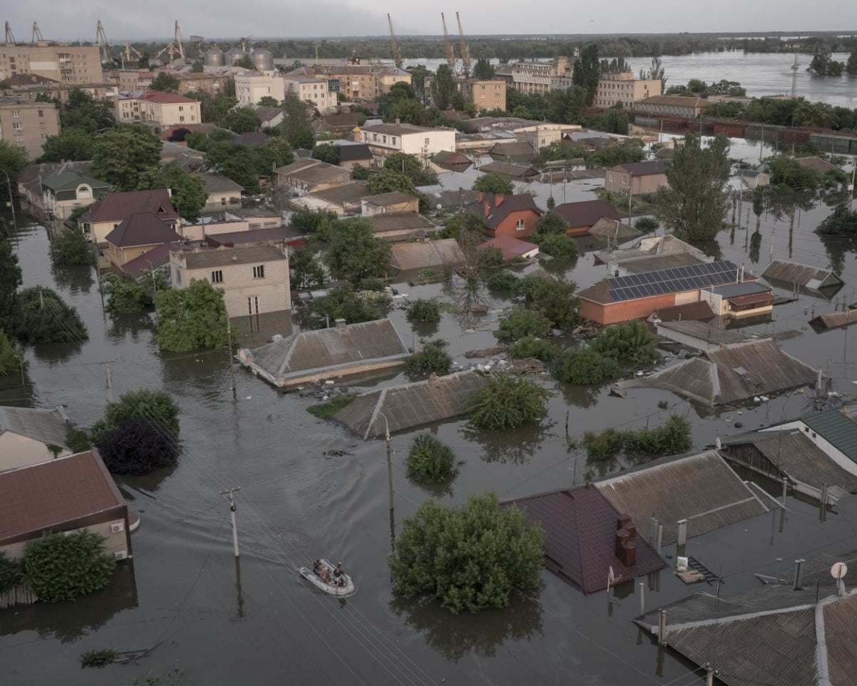 An overview of a flooded area of Kherson, taken from a tower block. At the time, Ukrainian authorities estimated that more than 40,000 people would need to be evacuated. Kherson, Ukraine, 7 June 2023. 