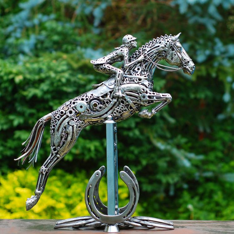 Sculpture Of Jockey Riding Horse Made Out Of Scrap Metal