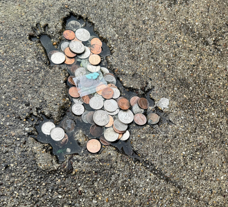 Chicago Rat Hole filled with coins