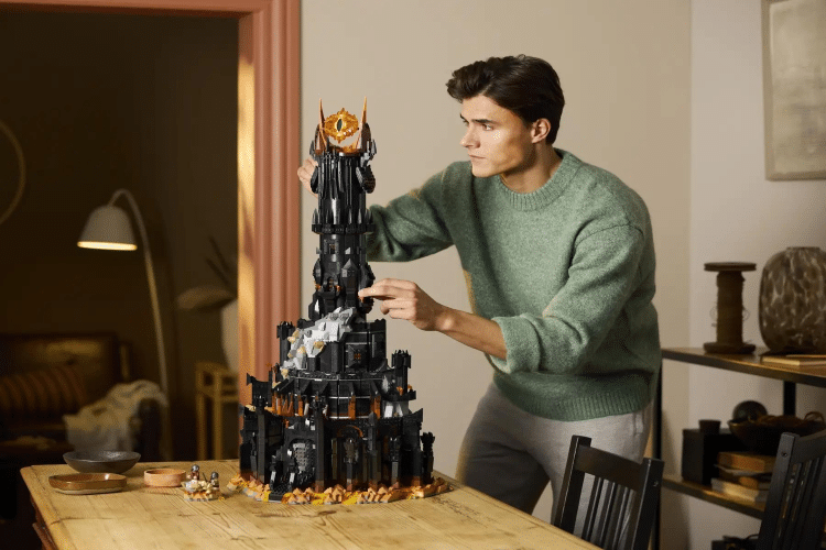 Man Assembling Dark Tower LEGO Set