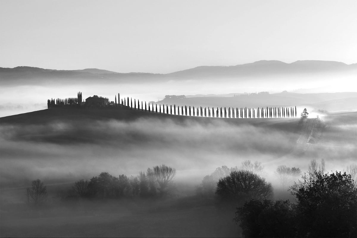 Black and white landscape photo of the Val d'Orcia