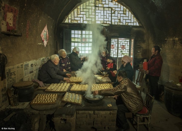 Family in China making dumplings