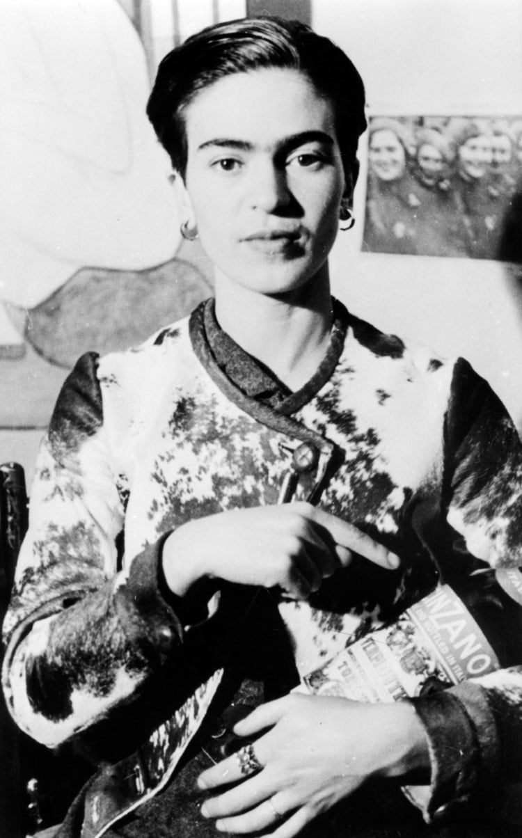 Portait of Frida Kahlo holding a Cinzano bottle