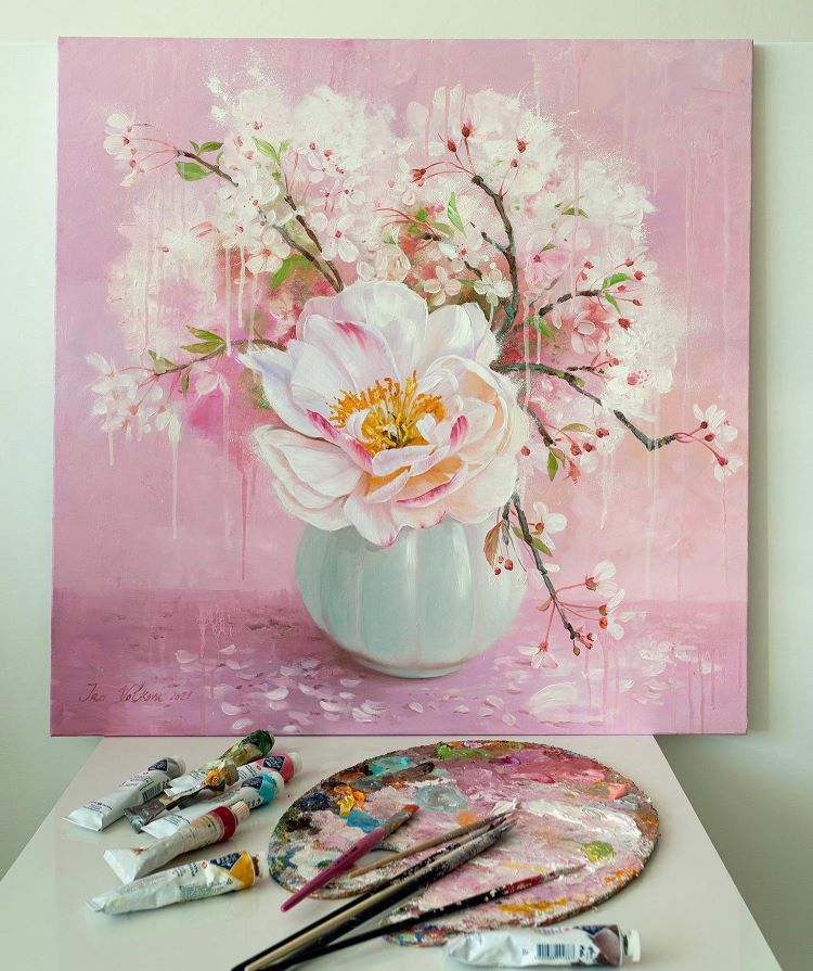 Detailed Painting Of Pink Flowers In A Blue Vase With The Easel In Frame