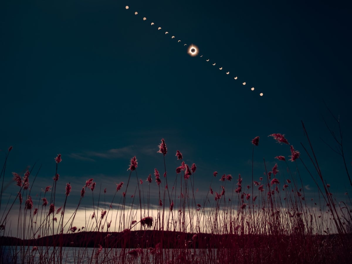 Composite of eclipse phases over an open field
