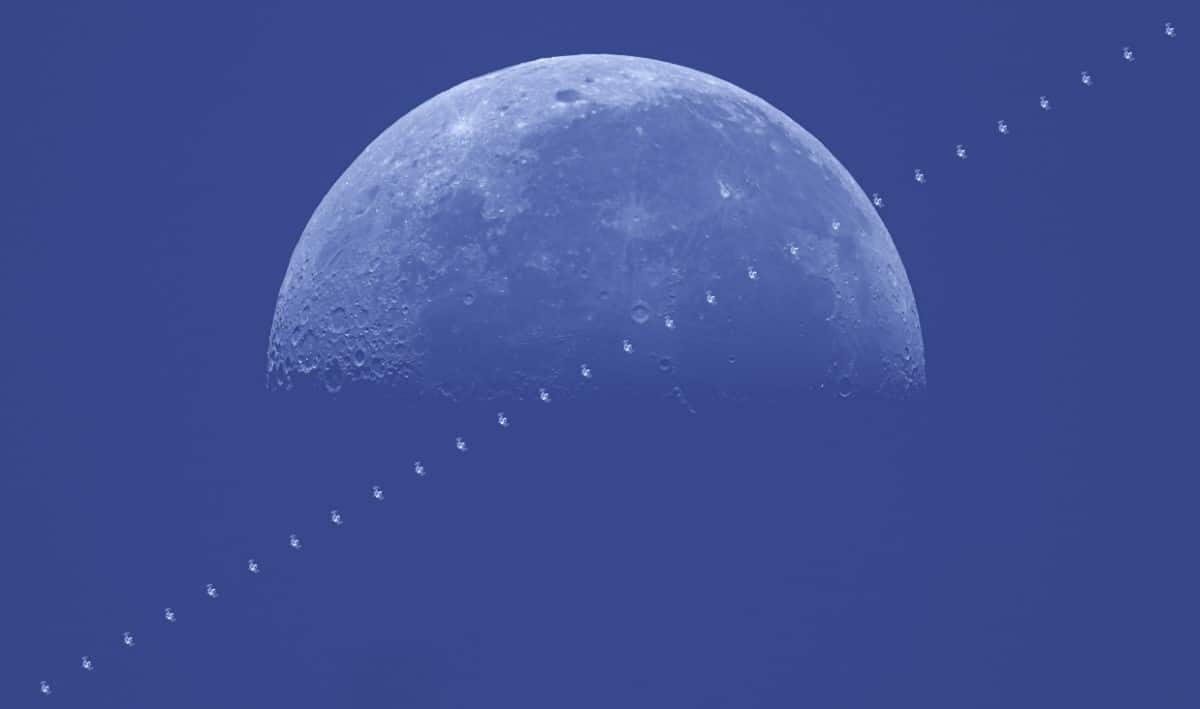 International Space Station (ISS) transiting the 51 percent illuminated Moon. 