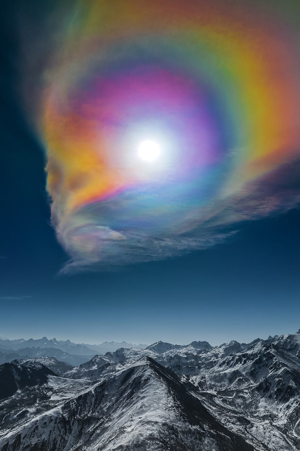 During the Spring Festival, the Sun and altostratus clouds acted together to create this huge corona, soaring above the Himalayas. 