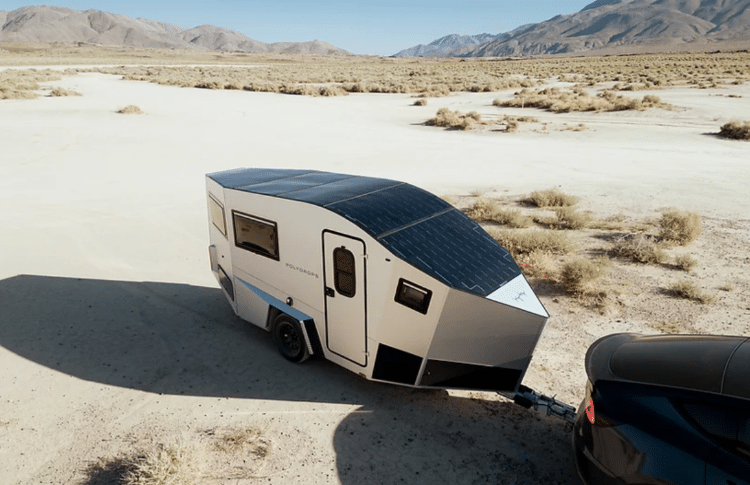 Overhead Shot Of Camper Trailer With Solar Panels On Roof