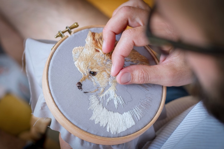 Dog portrait being embroidered