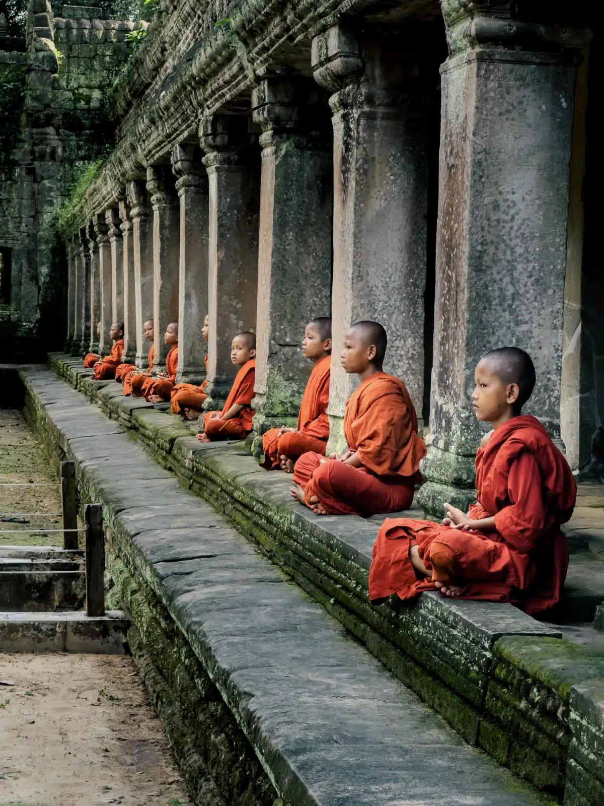 Students sitting at temple in Siem Reap⁩, ⁨Cambodia