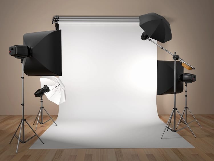 Photo shoot setup with a white backdrop