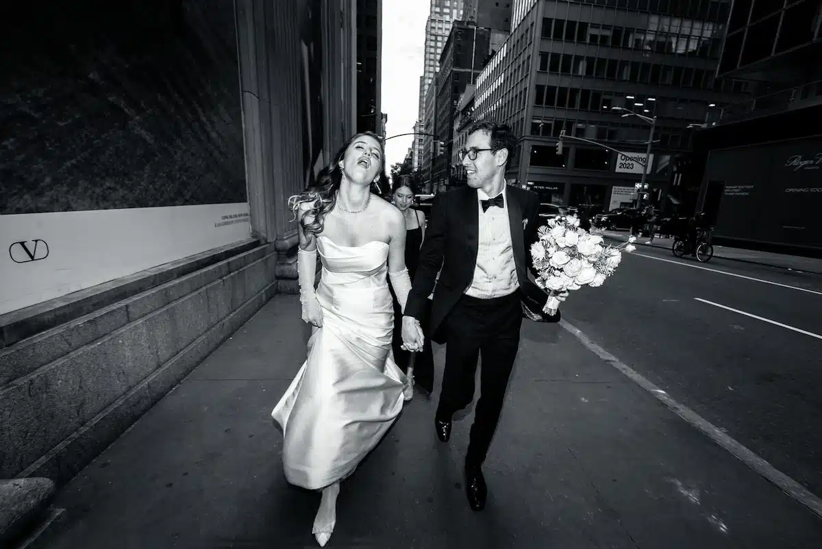 Black and white photo of couple after their wedding on the street of New York