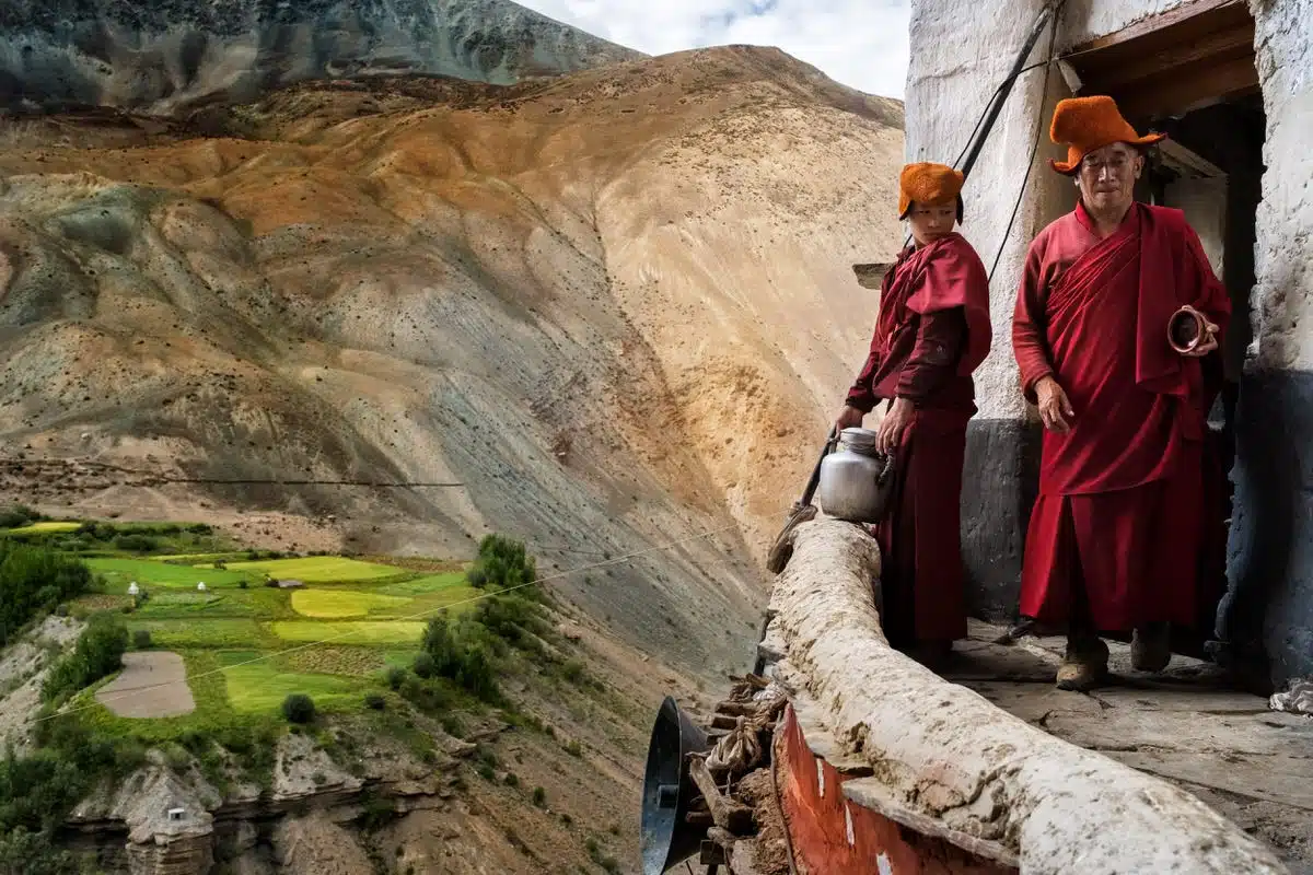 In the remote Phuktal monastery of Ladakh, a young monk awaits the arrival of Master Lamas to begin serving breakfast.