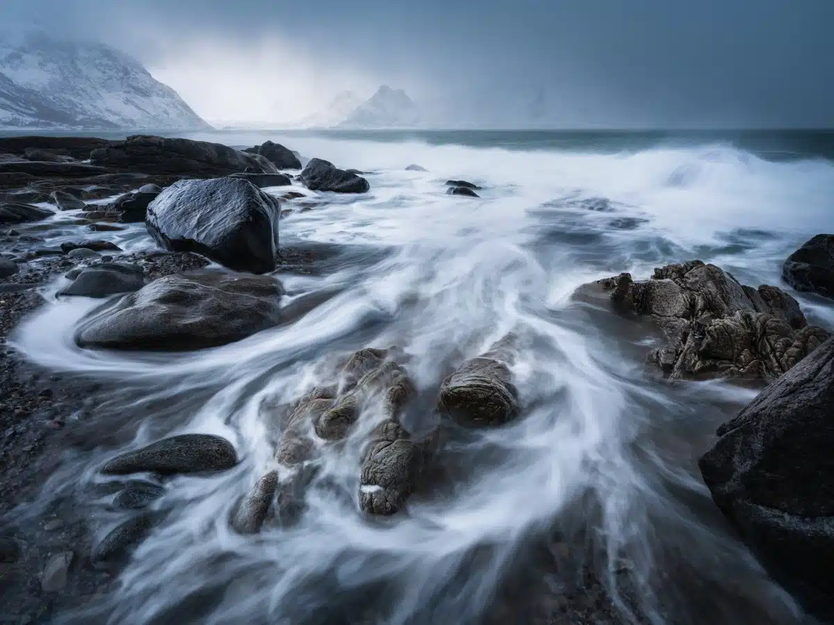 Water rolling through stones off the coast of the Lofoten Islands