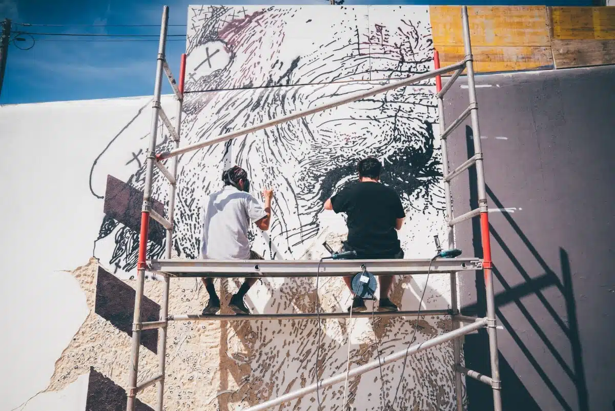 Vhils working on Lisbon mural