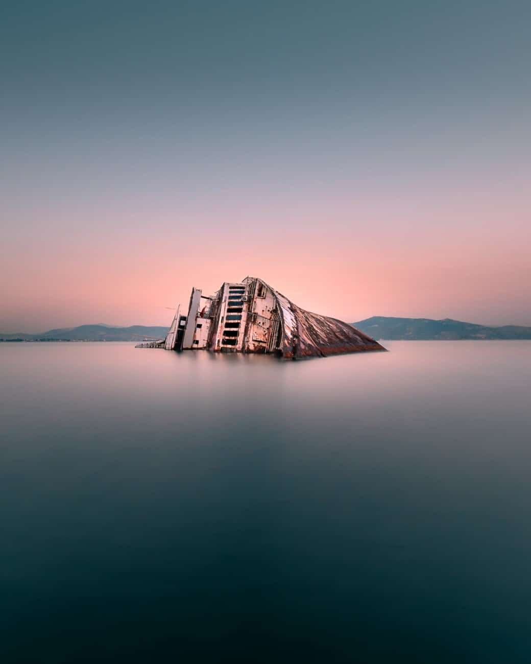 The wreck of the 'Mediterranean Sky' stands still just outside the port of Elefsina in Greece