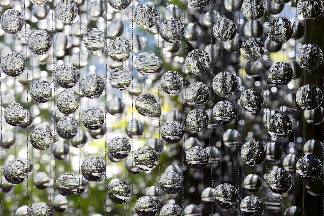 "A Whisper in the Eye of the Storm" by Caitlind r.c. Brown and Wayne Garrett, which uses 14,000 prescription lenses to create what looks like suspended rain drops.