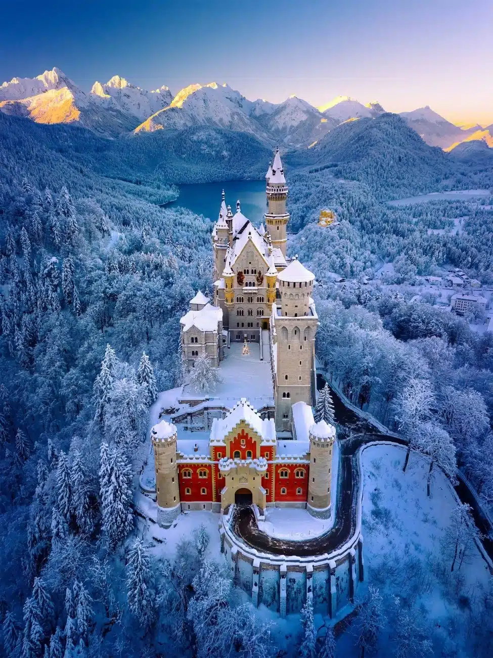 Drone-captured image reveals Neuschwanstein Castle in the serene light of an early winter morning