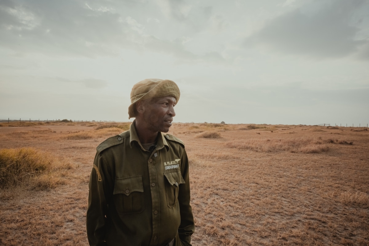 Northern white rhino caretaker by Mital Patel