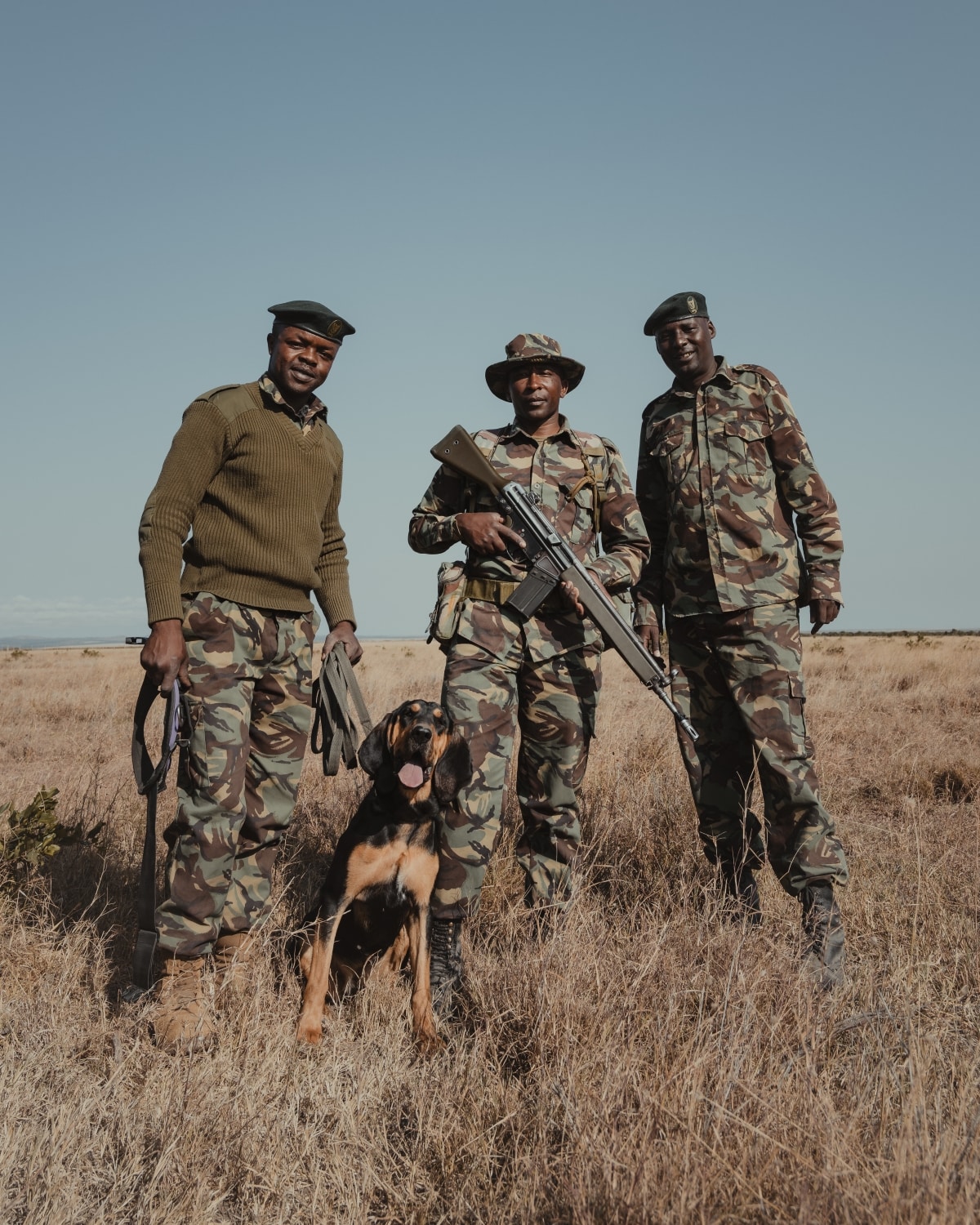 Northern white rhino caretakers by Mital Patel