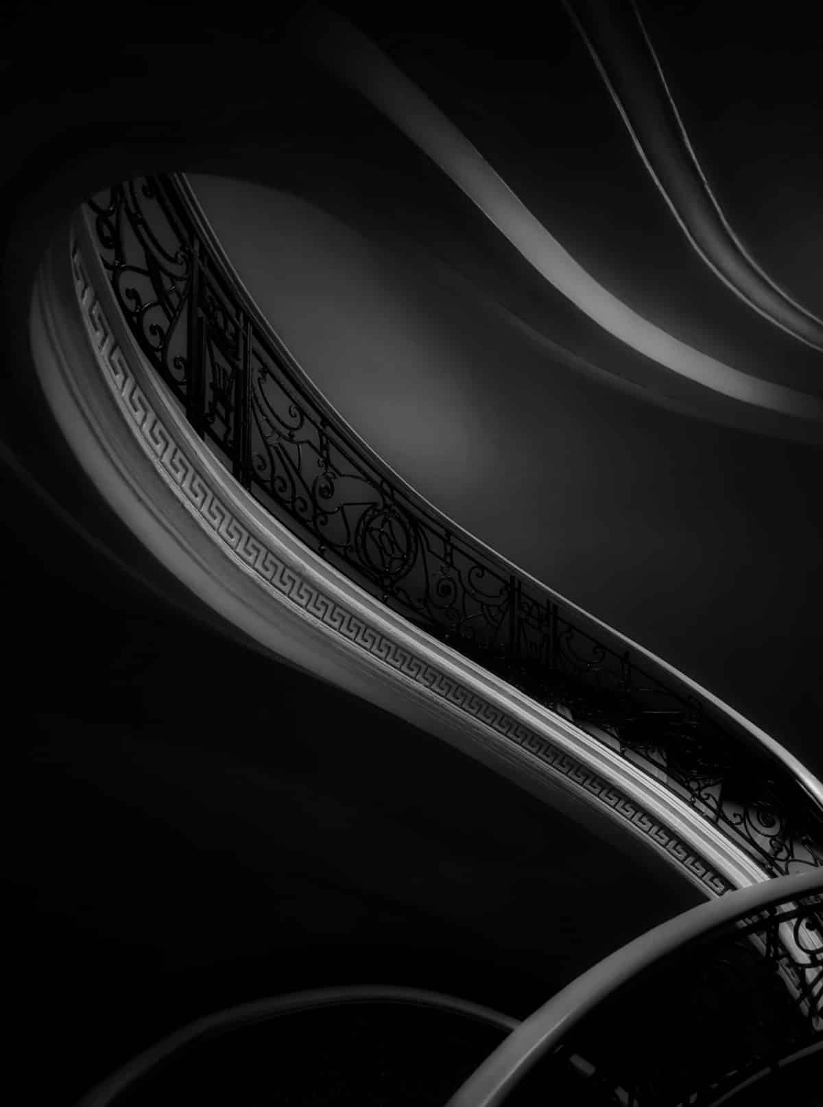 Mesmerizing curves of an internal staircase within the historic National Museum of Fine Arts in Manila.